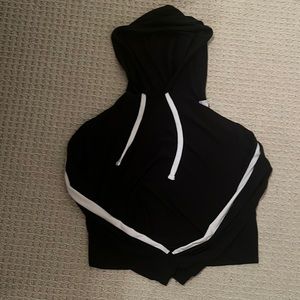 Thin sweatshirt a little bit cropped but not much